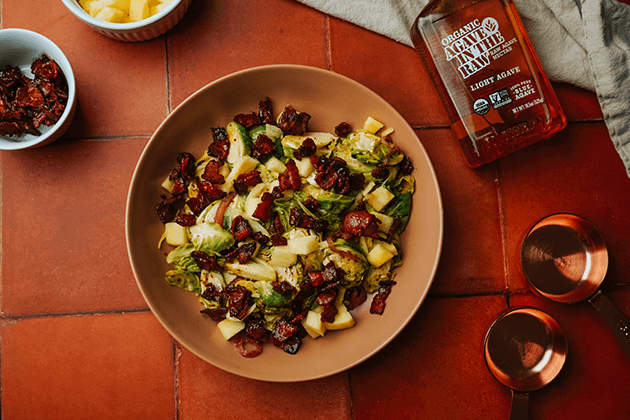Shaved Brussel Sprouts Salad with Warm Candied Bacon Dressing